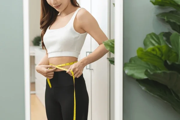 weight-lose-loss-concept-slim-body-600nw-2402389227